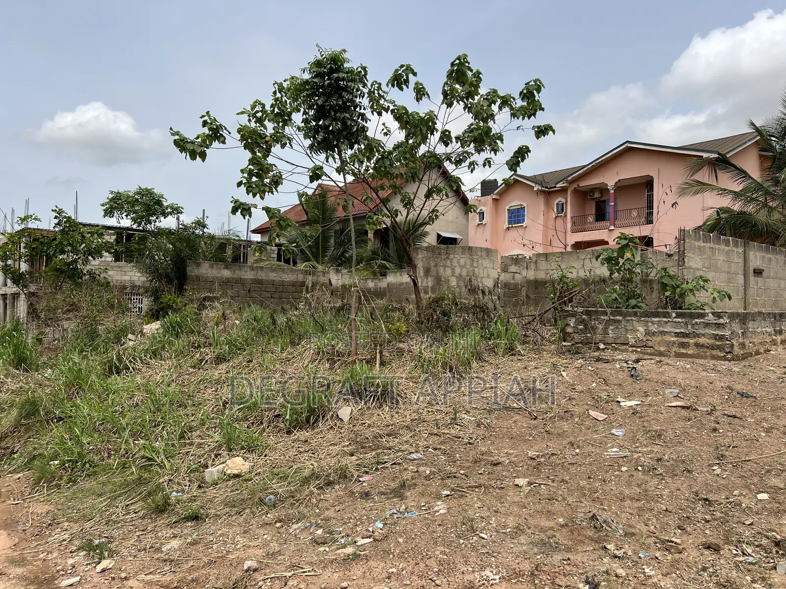 Full Plot With an Old Structure for Sale at Denkyemuoso Near Kwadaso