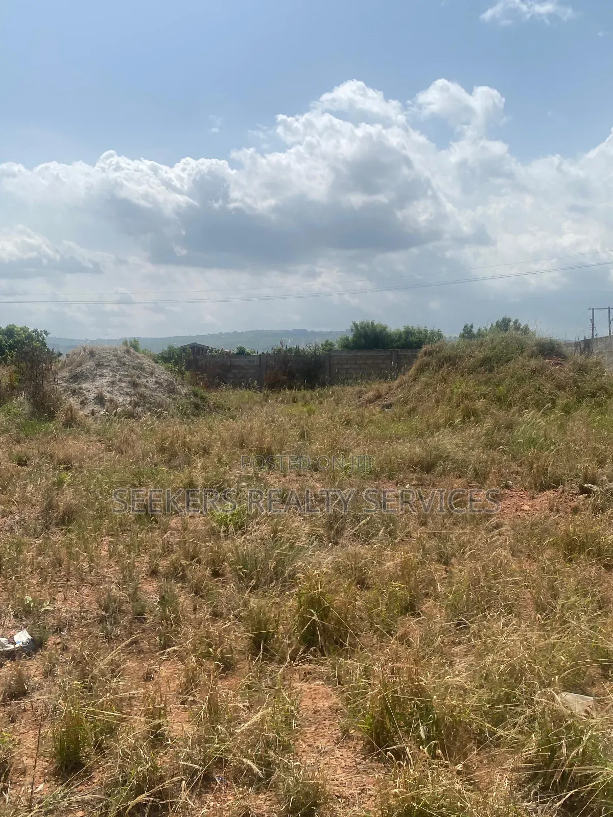 Roadside Land Walled and Gated 3 Plots of Land