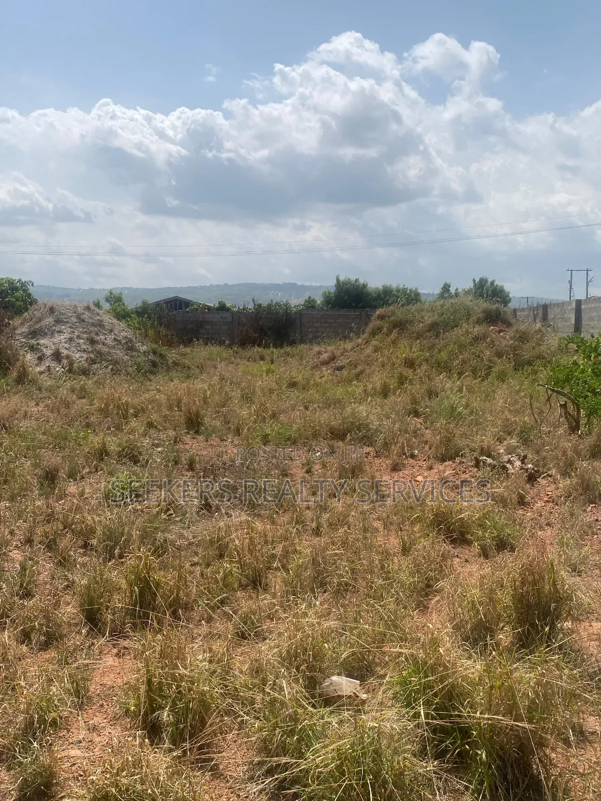 Roadside Land Walled and Gated 3 Plots of Land