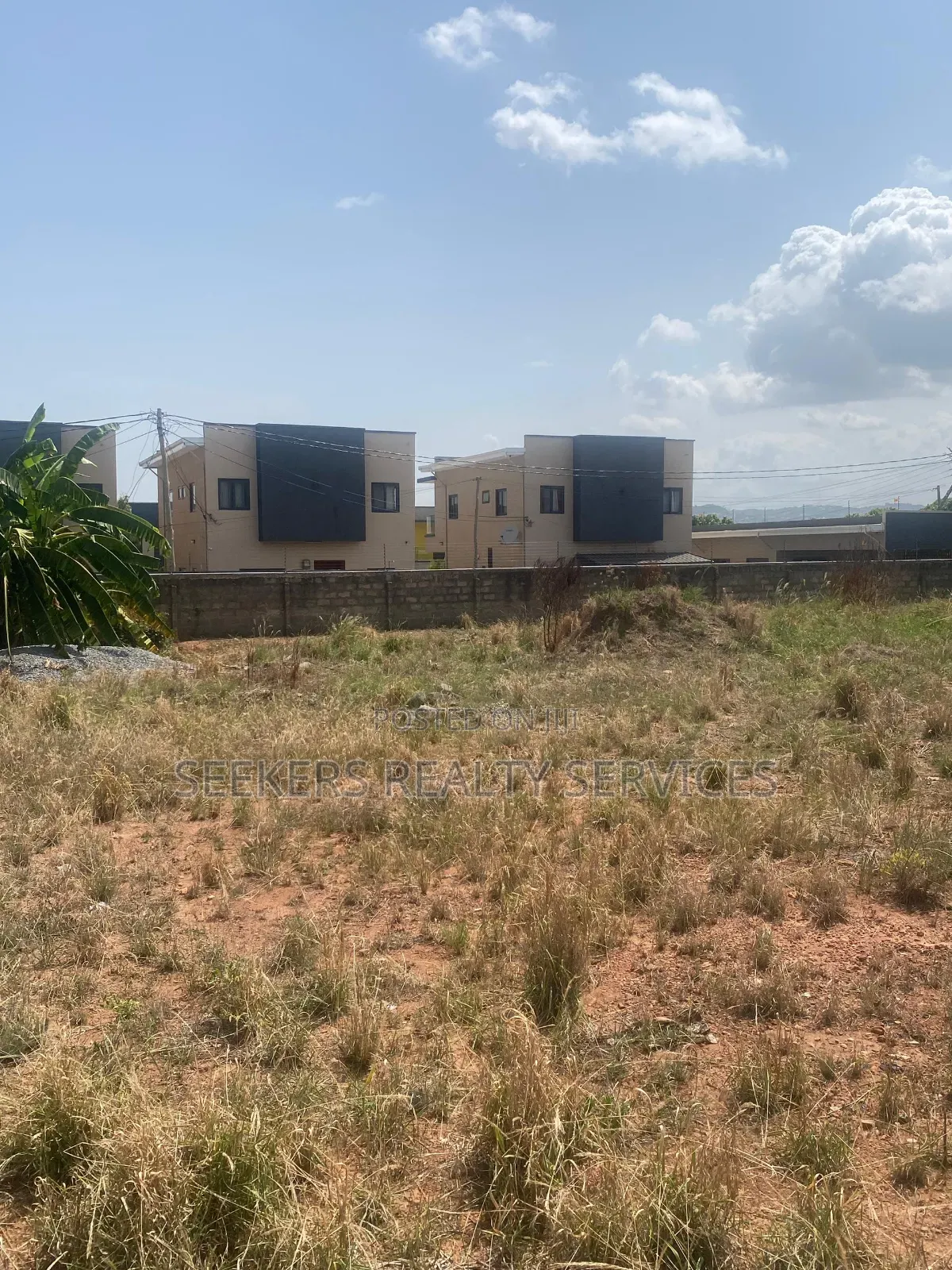 Roadside Land Walled and Gated 3 Plots of Land