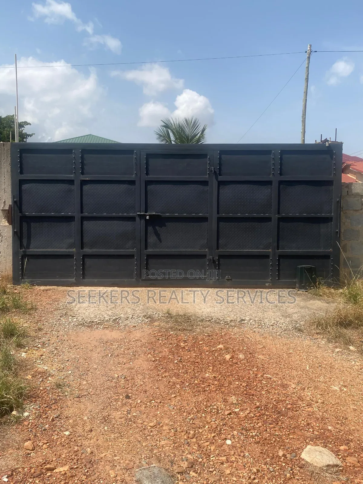 Roadside Land Walled and Gated 3 Plots of Land