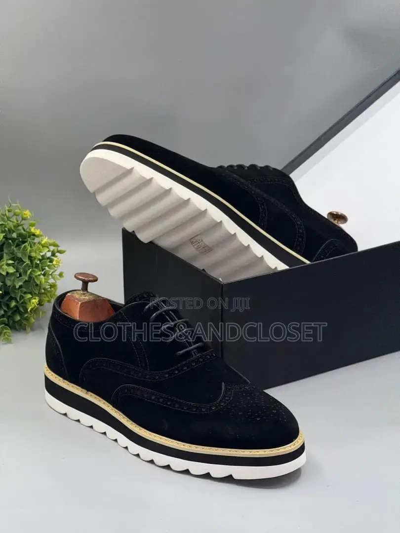 Timberland Brogue Shoes Featuring a Black Suede Upper