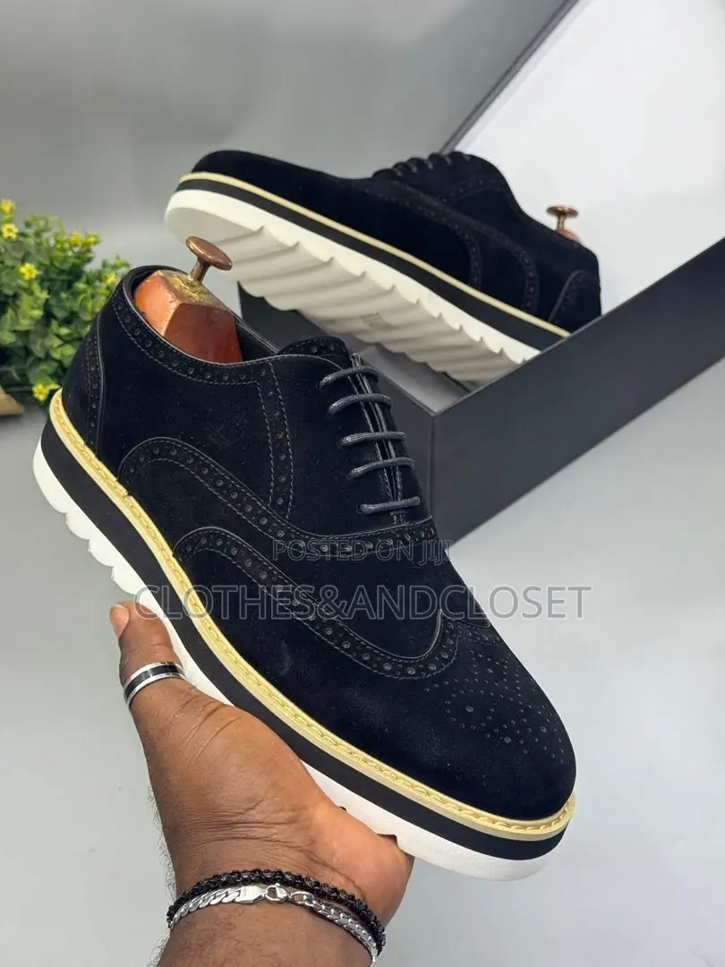 Timberland Brogue Shoes Featuring a Black Suede Upper