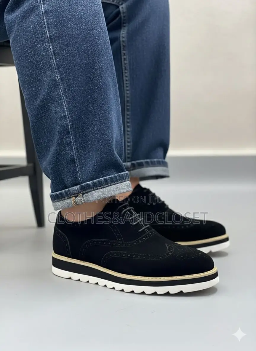 Timberland Brogue Shoes Featuring a Black Suede Upper