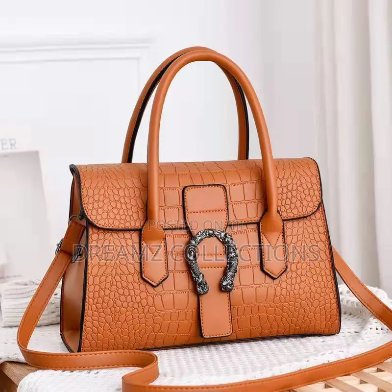 Regal Twin Buckle Handbag