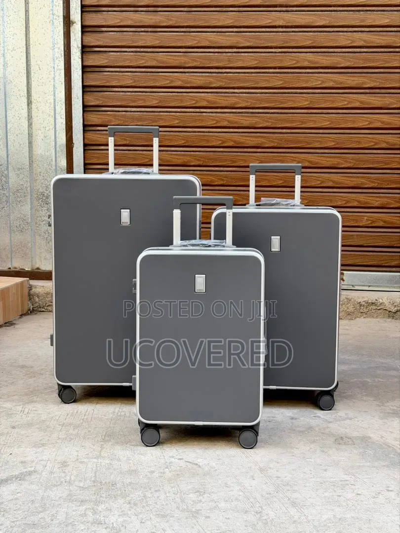 Hard-Shell Aluminum Trolley Suitcases Available as a Three-Piece Set.