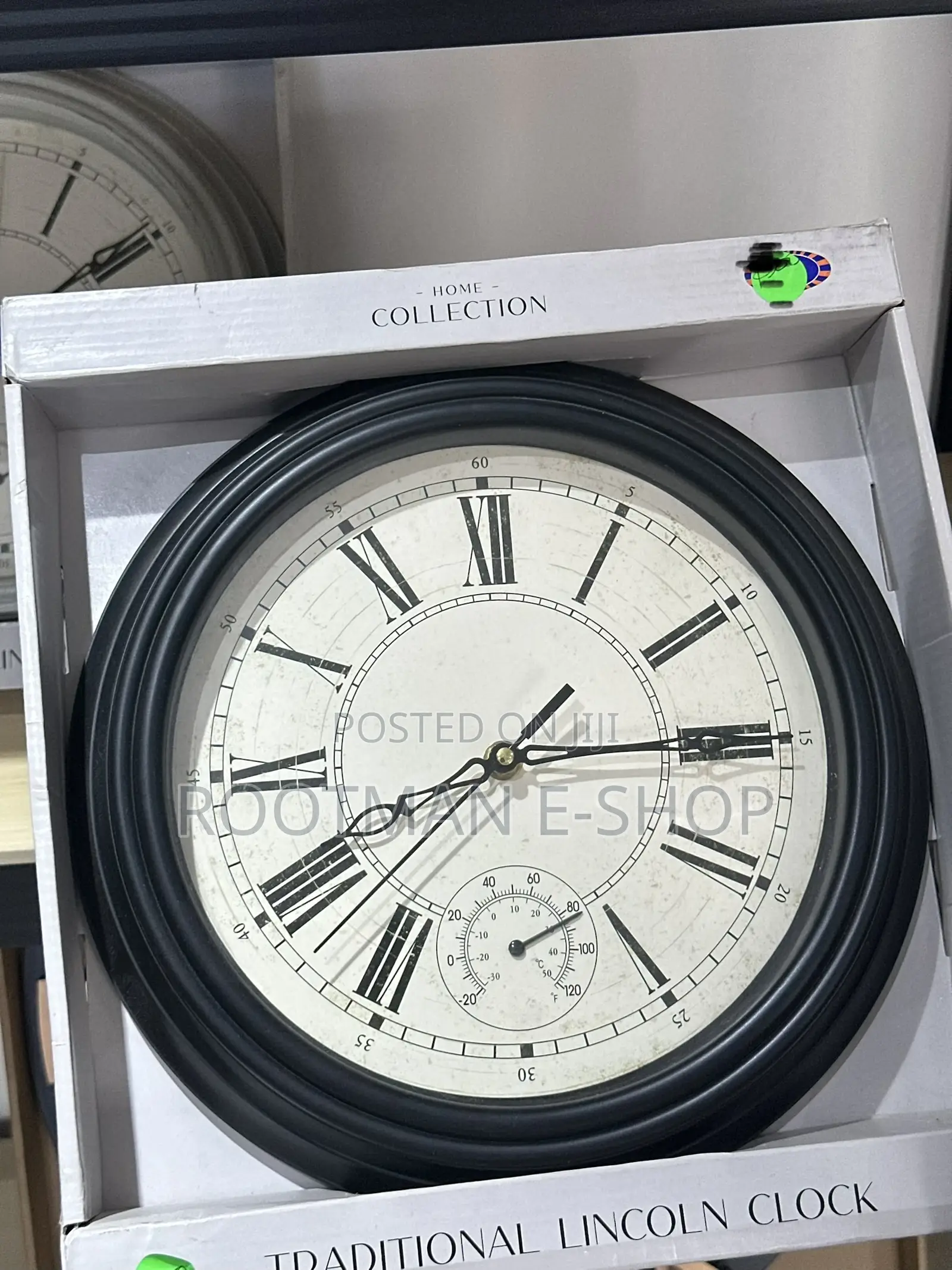 Home Collection Traditional Lincoln Wall Clock Featuring a Black Frame