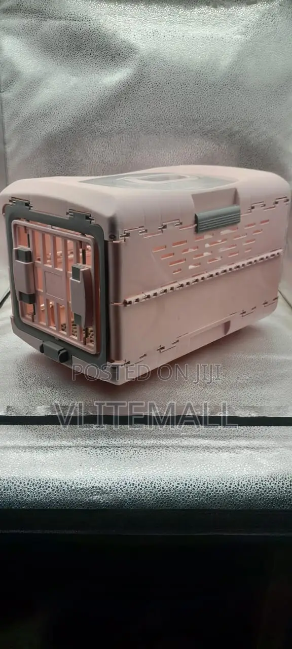 Pink Richell Foldable Travel Pet for Cats and Small Dogs.