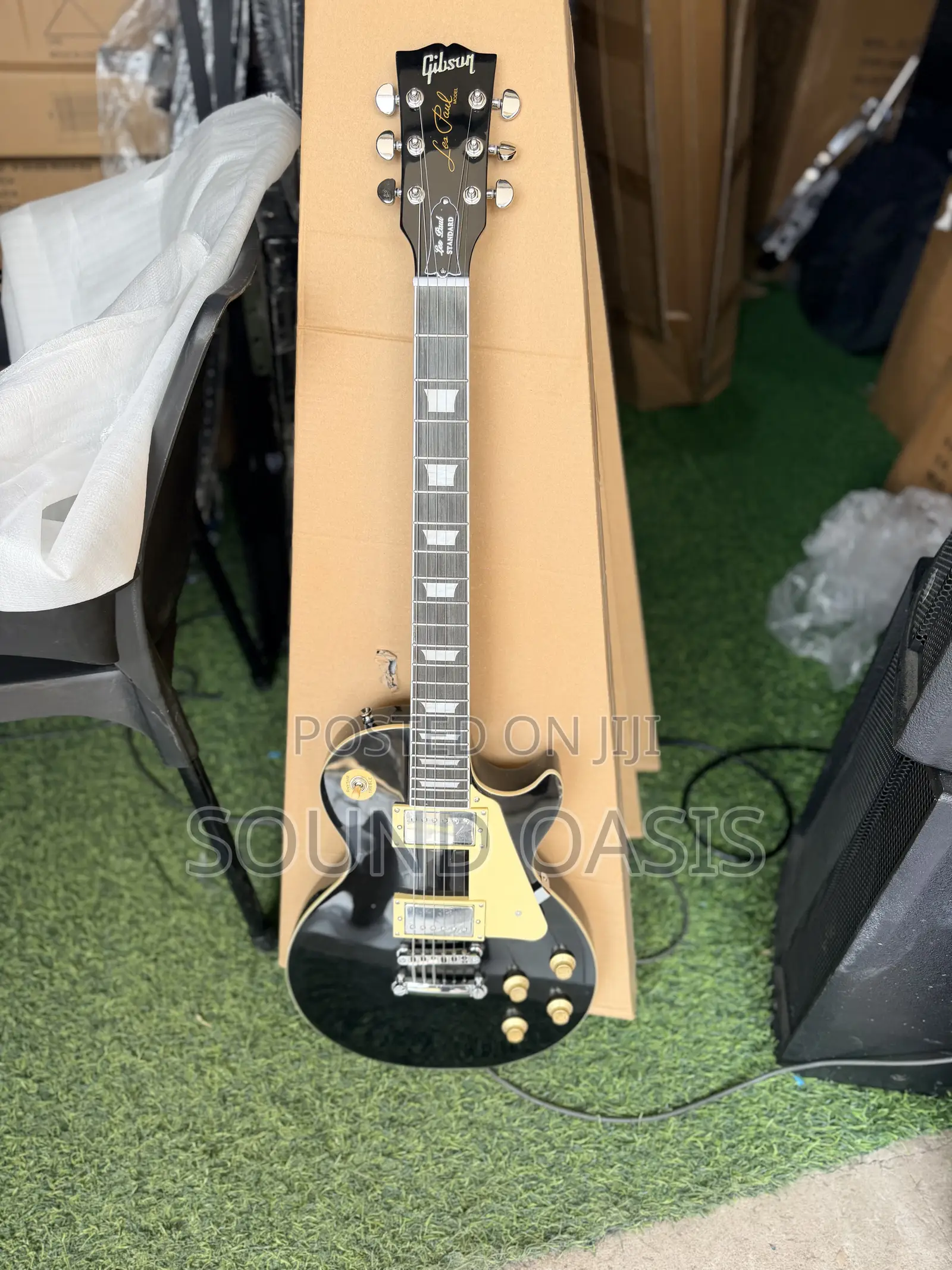 Black Gibson Les Paul Standard Electric Guitar.