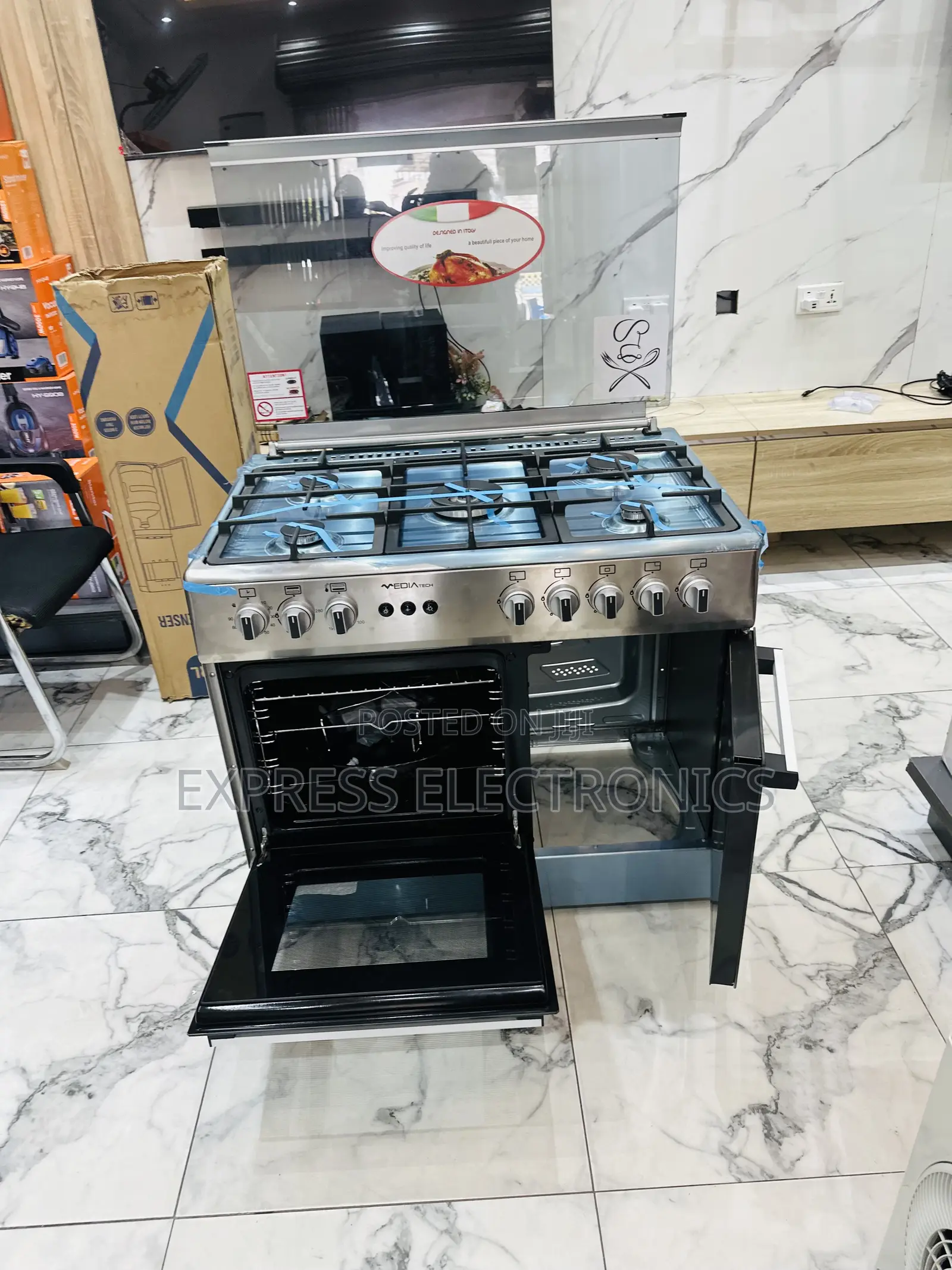 Better Deal on Midea Tech Sliver 5burner Oven Rotisserie