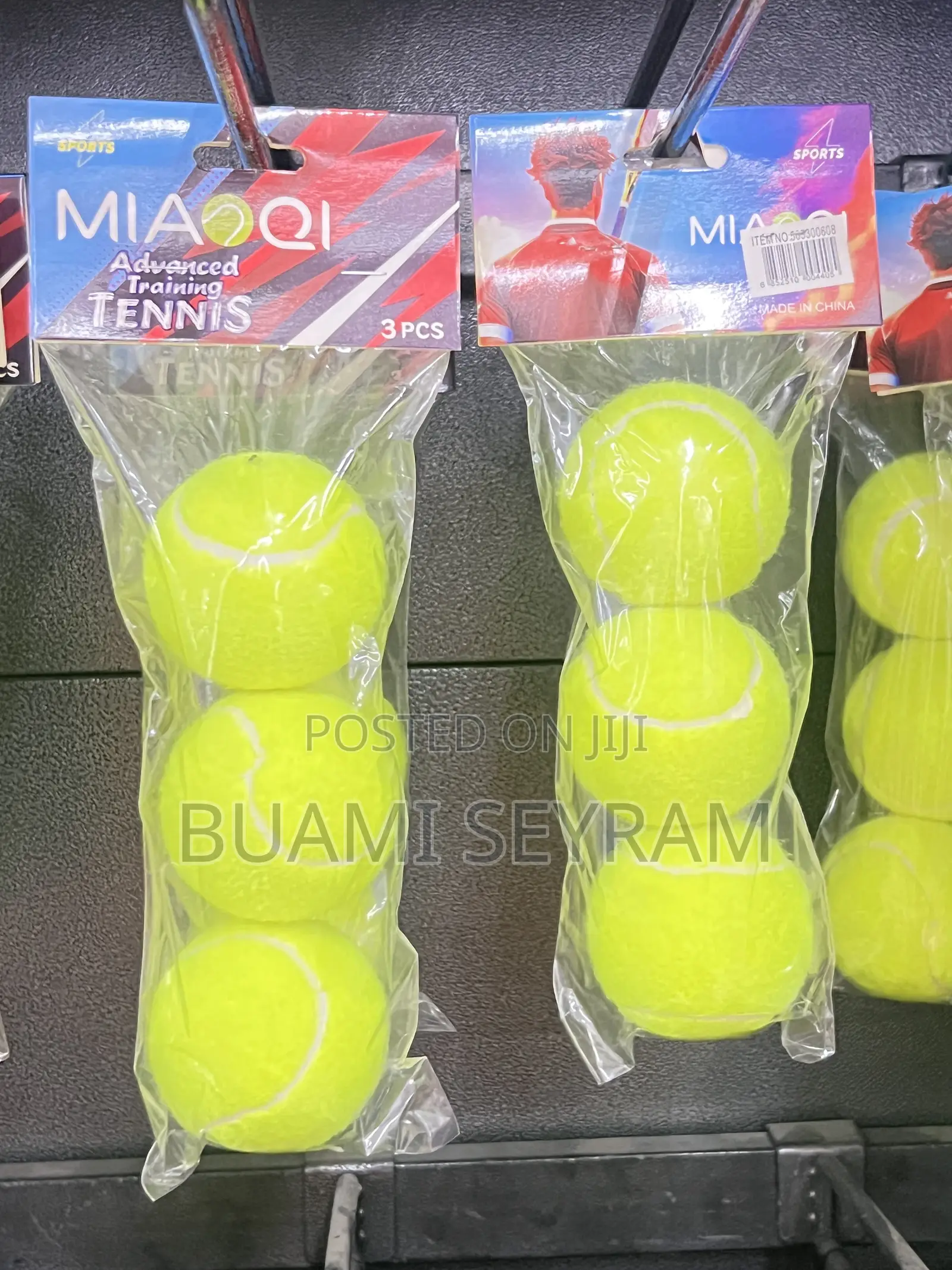 Three Packed Lawn Tennis Balls