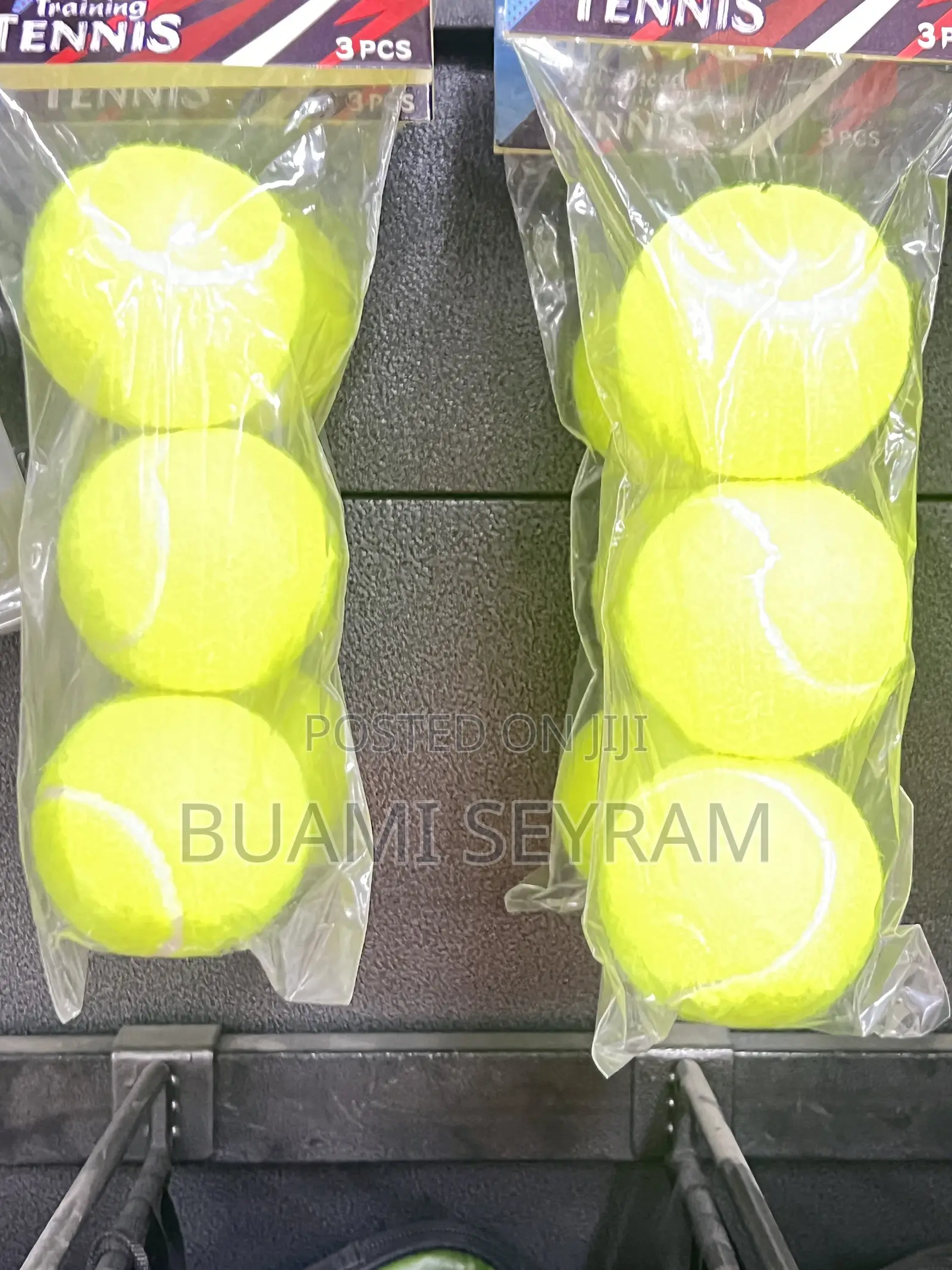 Three Packed Lawn Tennis Balls