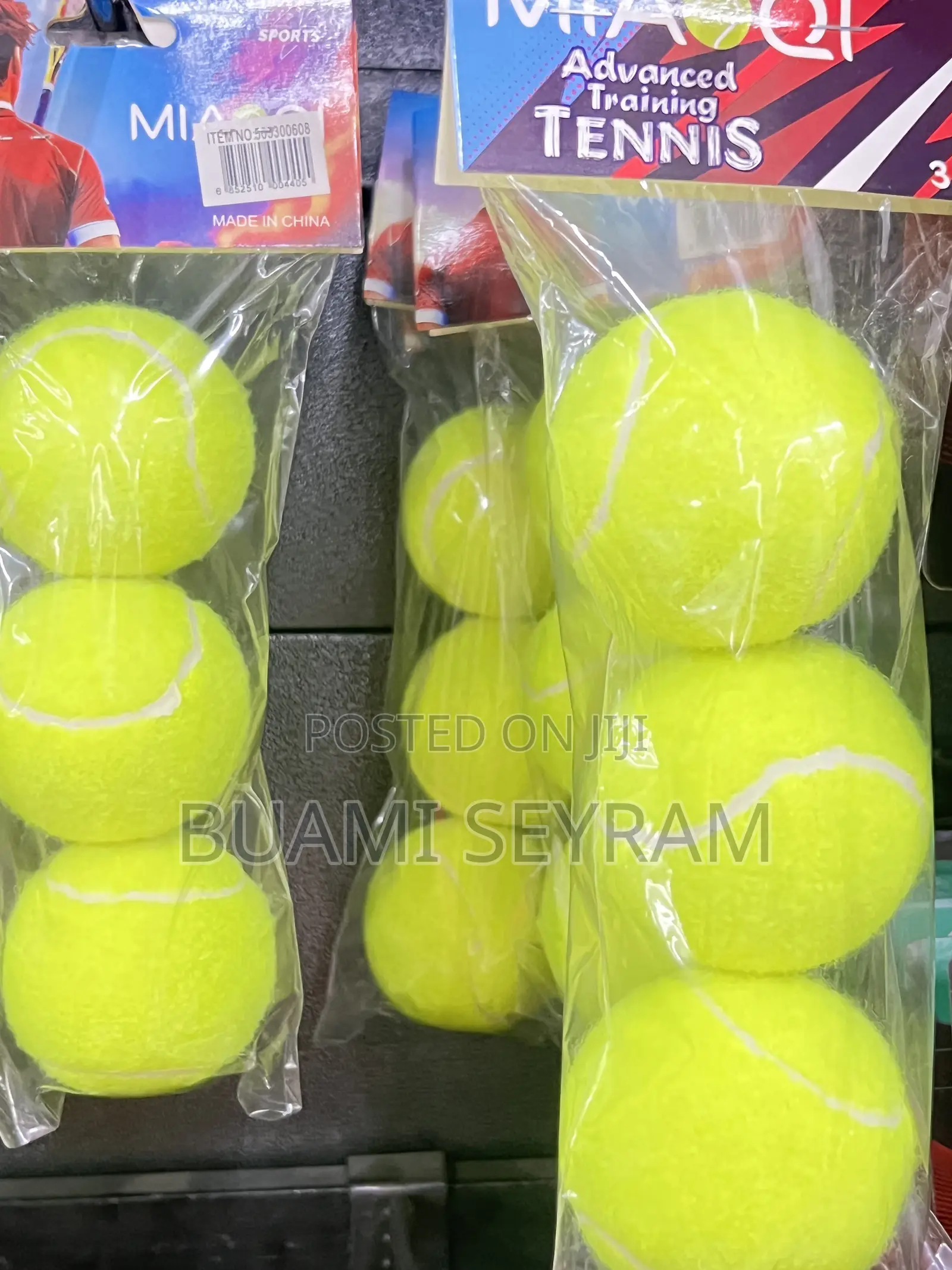 Three Packed Lawn Tennis Balls