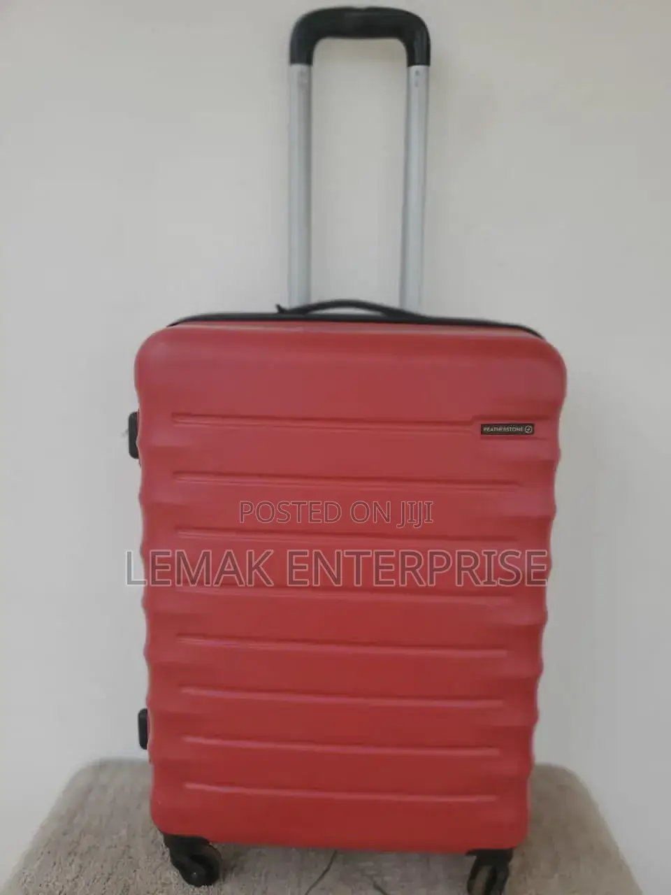 Featherstone Hard-Shell/ Traveling Suitcase . Red Color
Medium Size