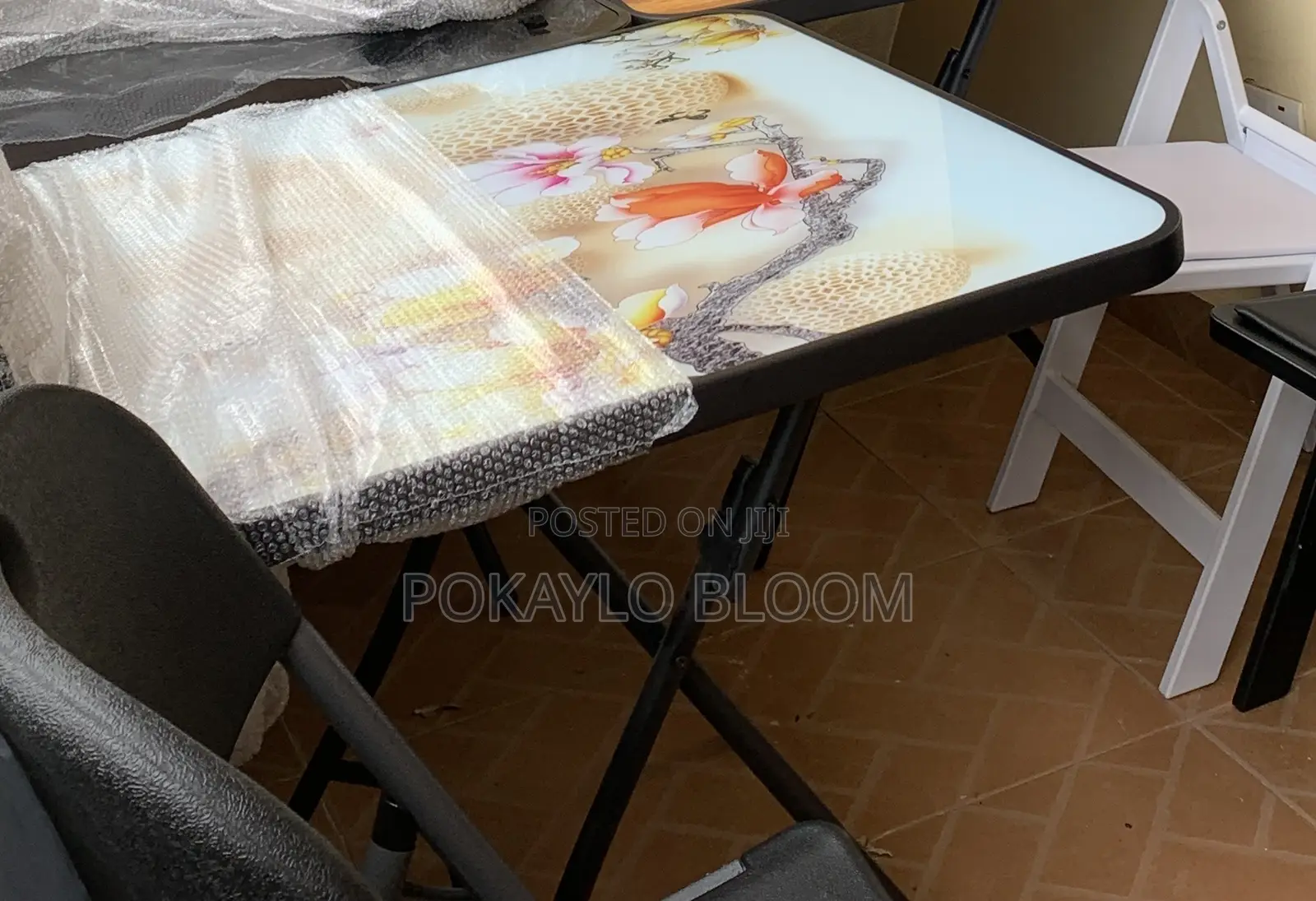 80by80 Foldable Table With a Tempered Glass Top With a Floral Design