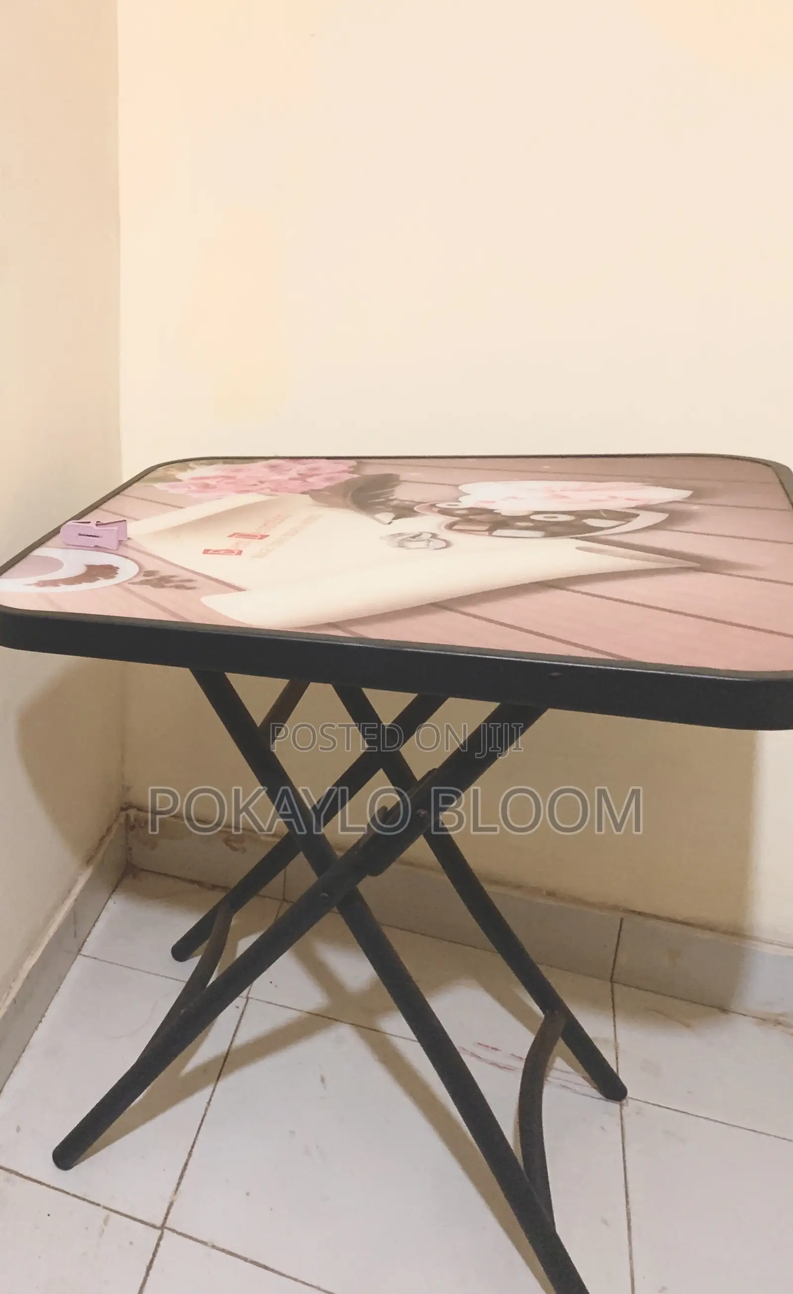 A Square Folding Table, "X-Frame" Design for Assembly Andstorage.