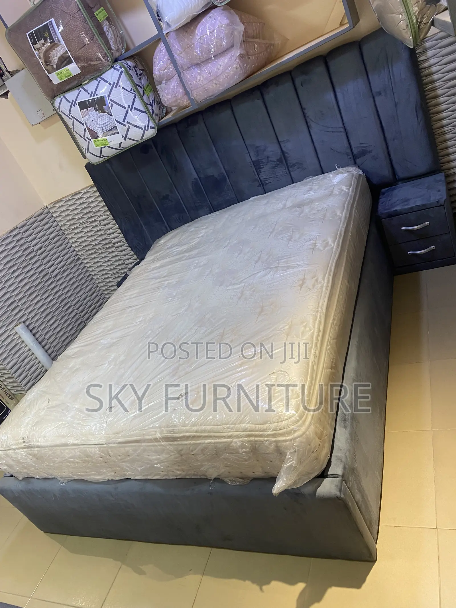 Oversized Double Bed With a Mattress Side Drawers