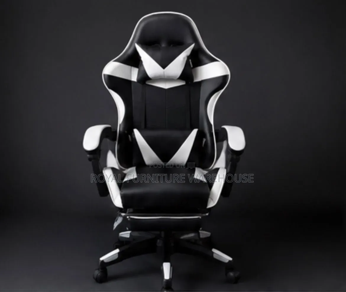 Black/White Ergonomic Gaming Chair With Footrest and Headrest Pillow.