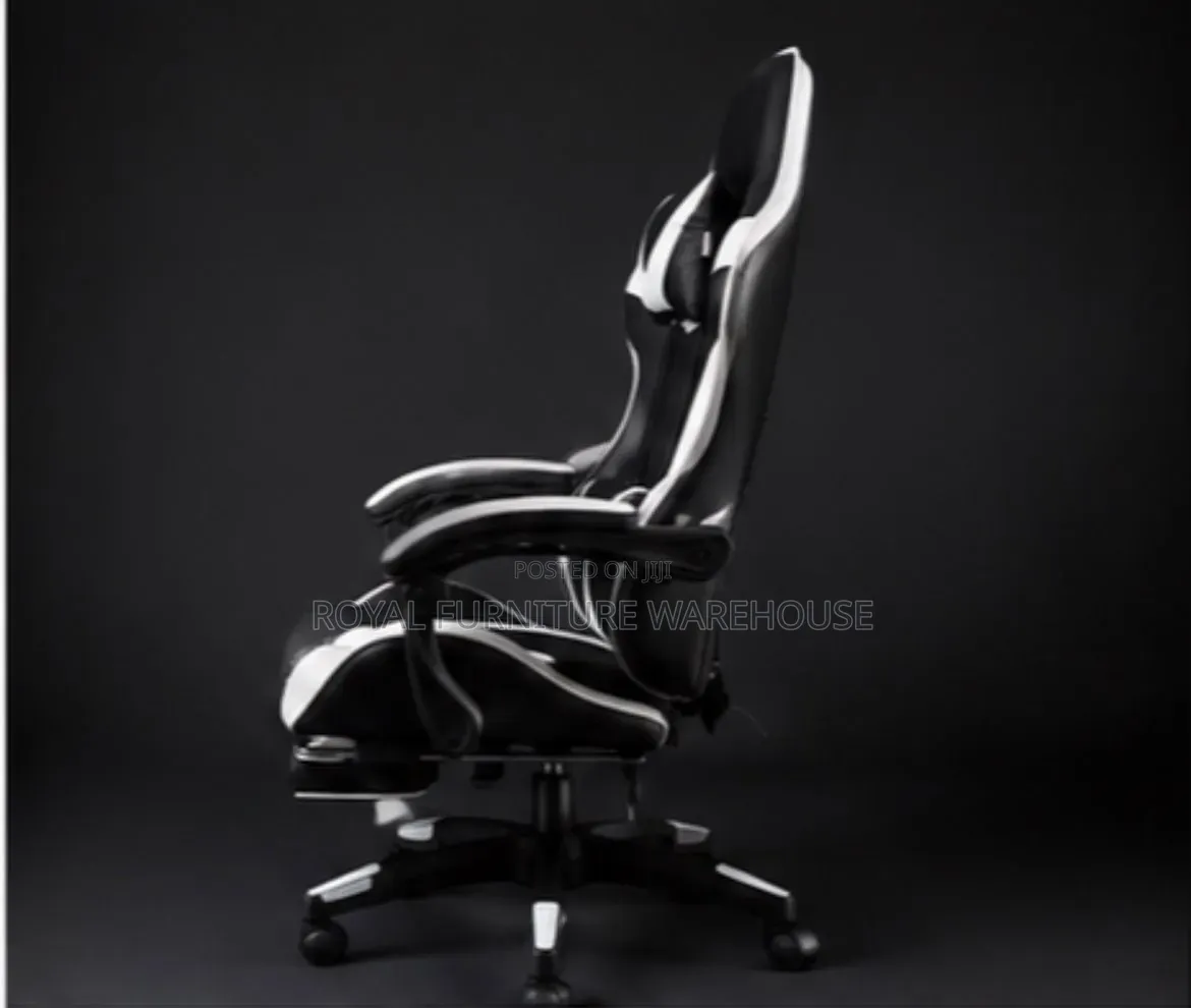 Black/White Ergonomic Gaming Chair With Footrest and Headrest Pillow.