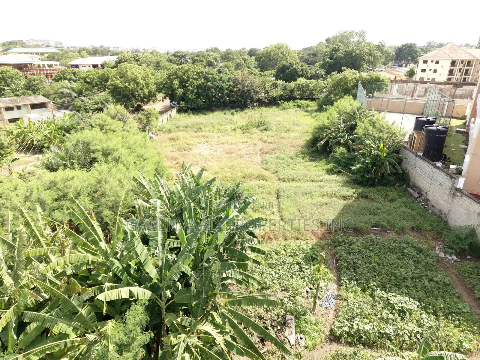 Titled Acre Airport Residential for Sale
