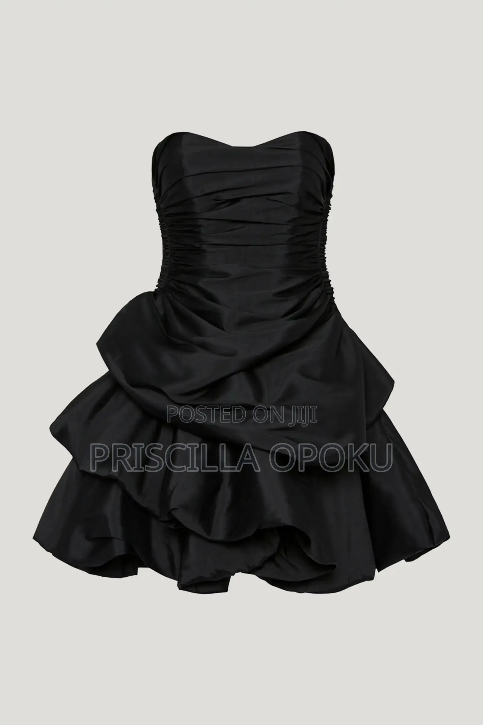 Mini Dress Features a Distinctive Tiered Ra-Ra Skirt A