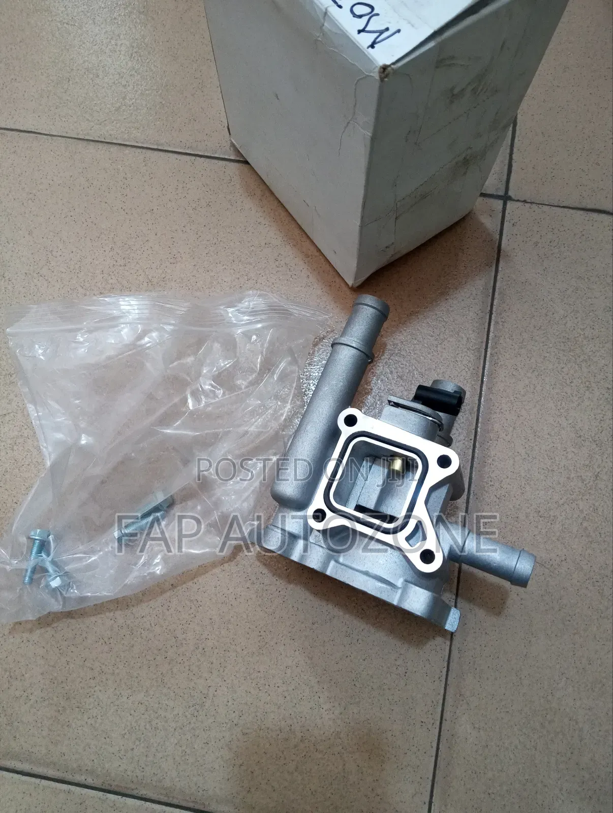 01295.Genuine Motorad Chevy Cruze Thermostat Housing Imported From Usa