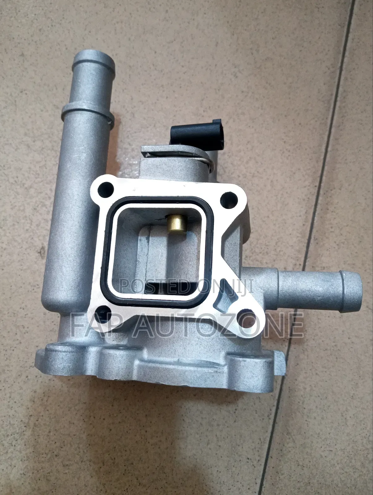 01295.Genuine Motorad Chevy Cruze Thermostat Housing Imported From Usa