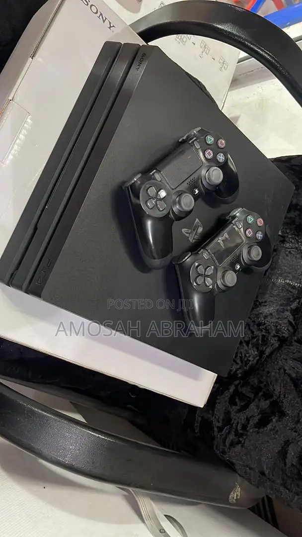Neat Ps4 Pro With 5 Games Installed With 2 Controllers
