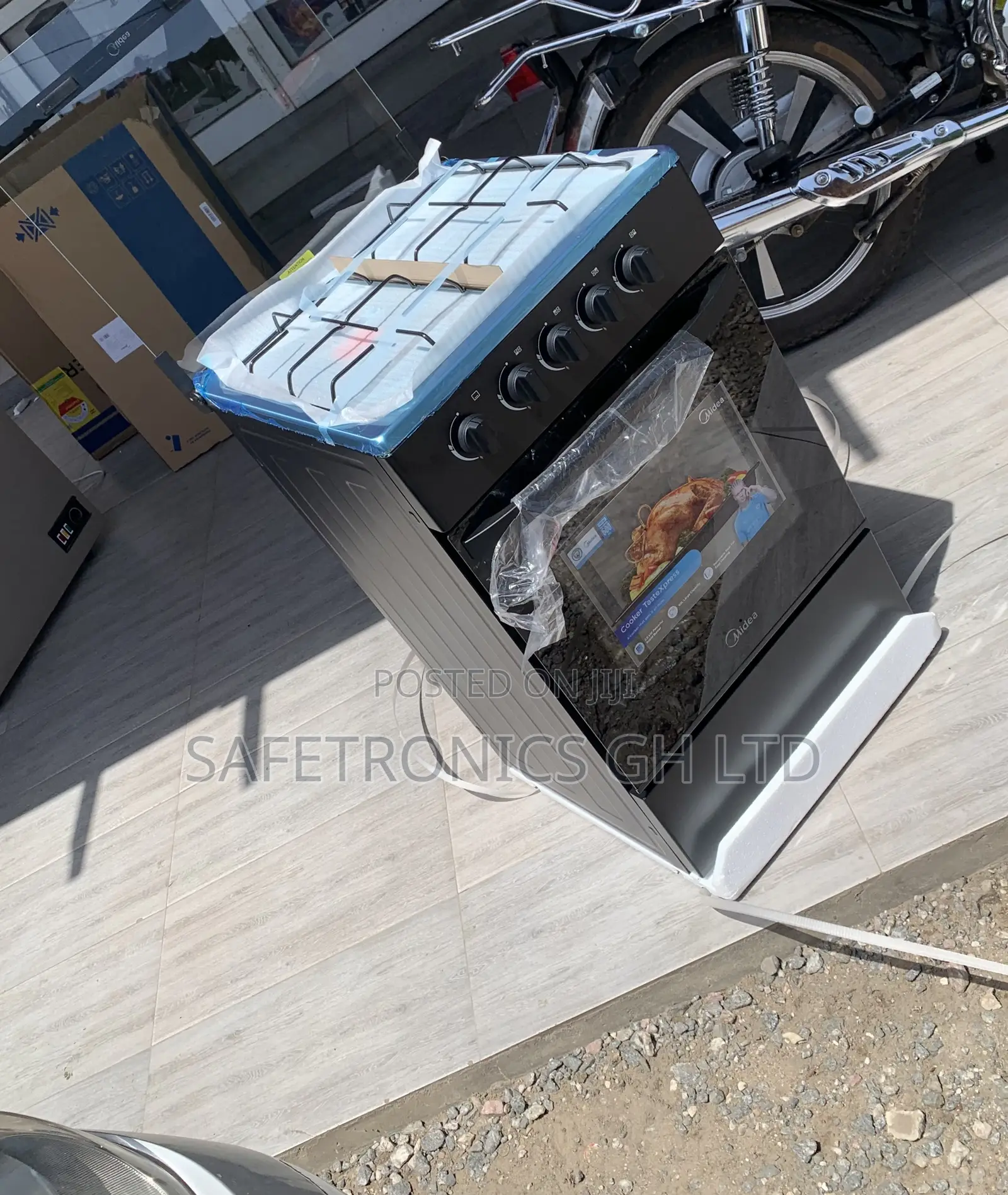 Kindly Buy Midea 4 Burner Gas Cooker Black
