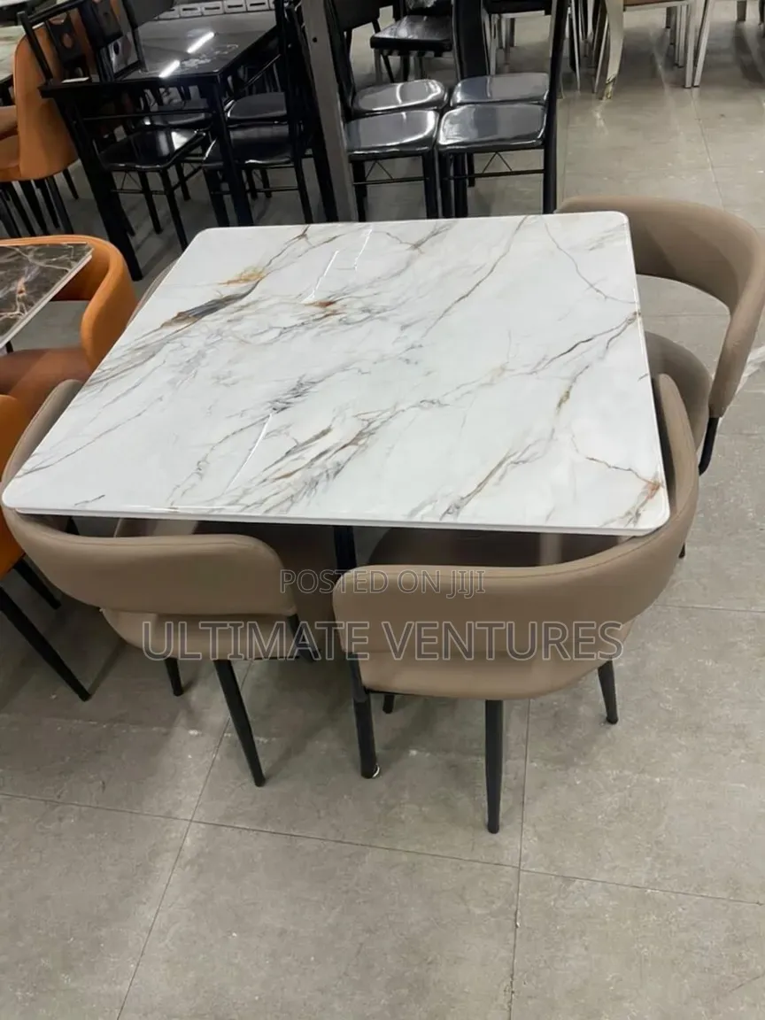 Modern 4-Seater Black Marble Dining Set With Orange Chairs