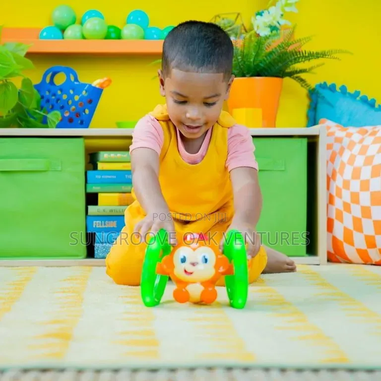 Bright Start Roll and Glow Monkey Crawling 6months +