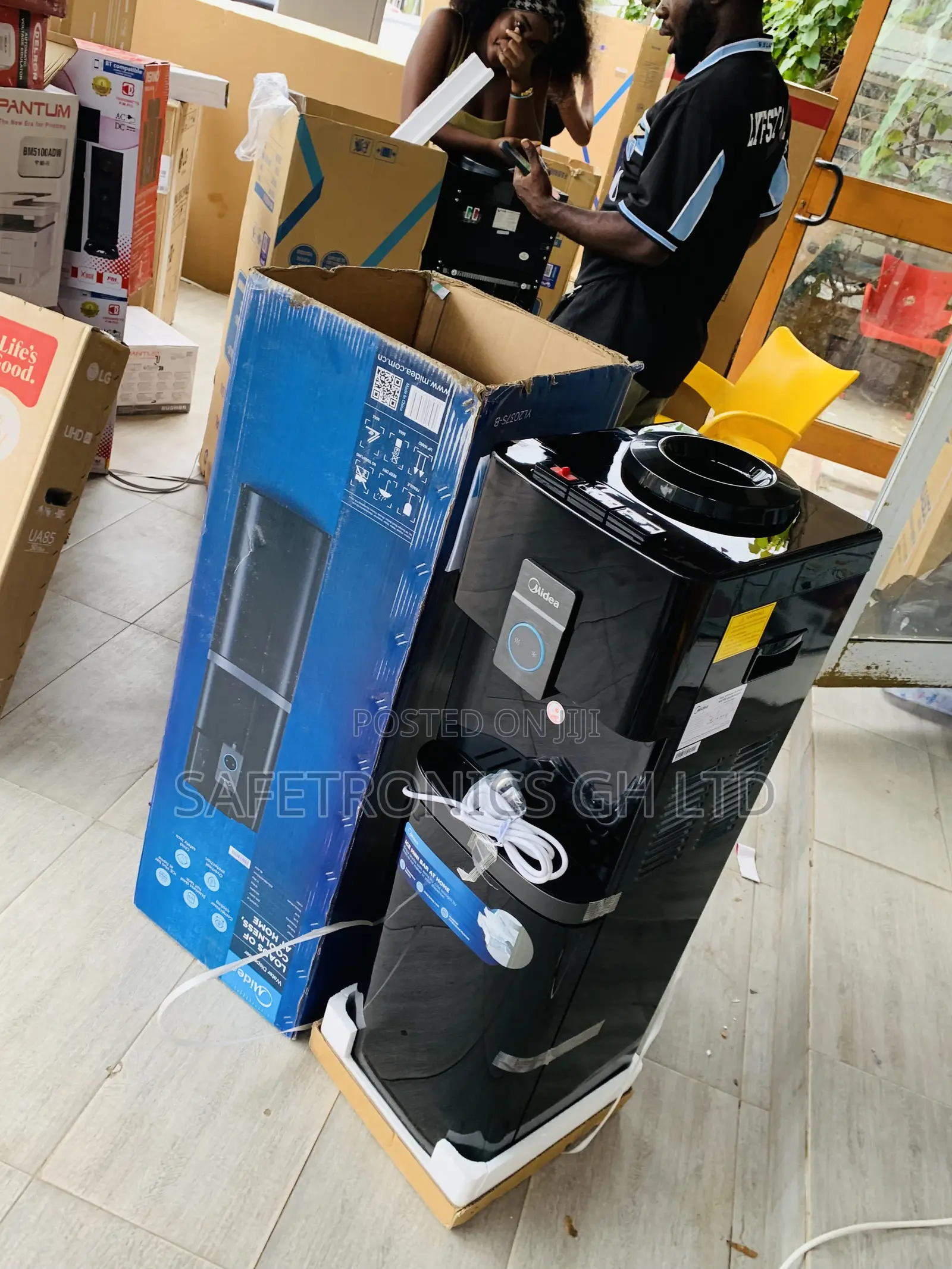 Grab Elegant Midea Top Loading Water Dispenser - Black