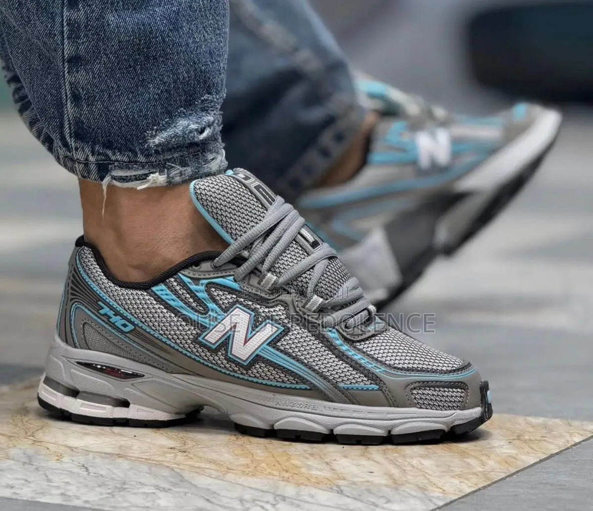 New Balance 740 in a Grey and Light Blue Sneakers