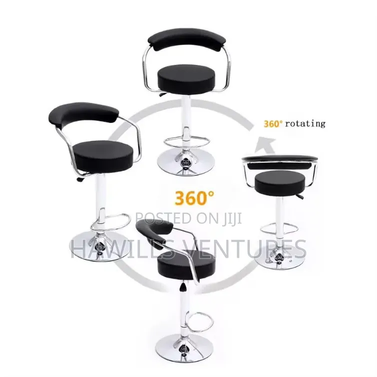 Swivel Bar Stool Featuring a Padded Seat and a Chrome Base.