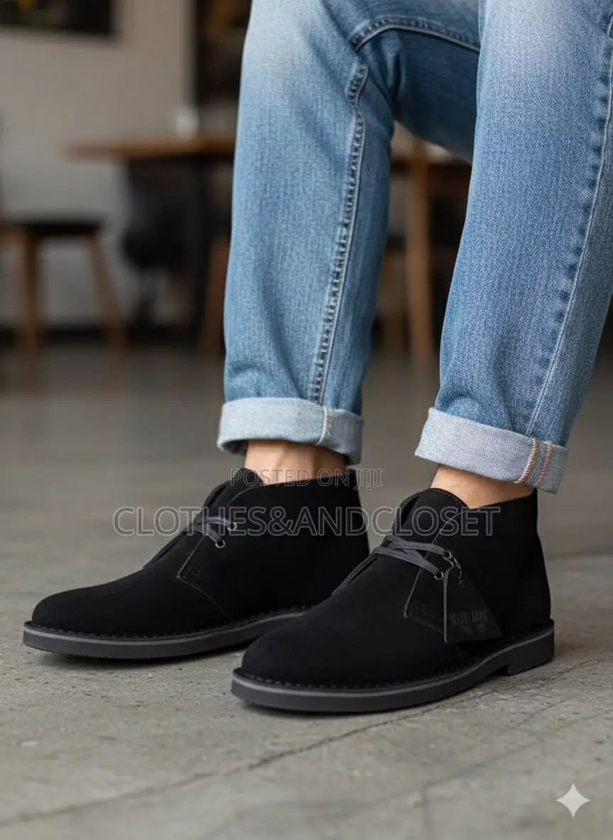 Clarks Desert Boots Feature a Black Suede Upper With Two-Eyelet Lacing