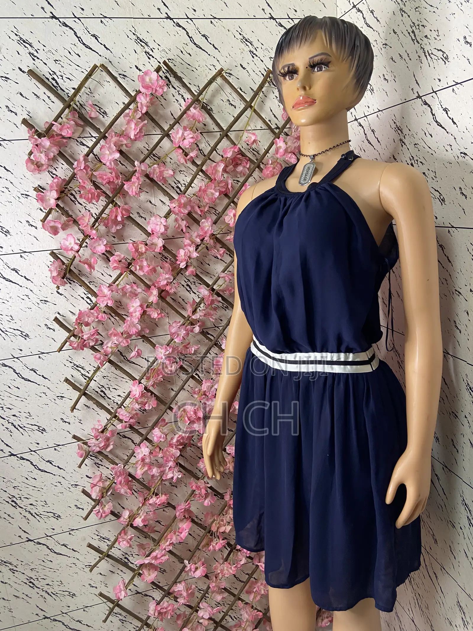 Simple, Chic and Effortlessly Beautiful Navy Blue Sleeveless Dress