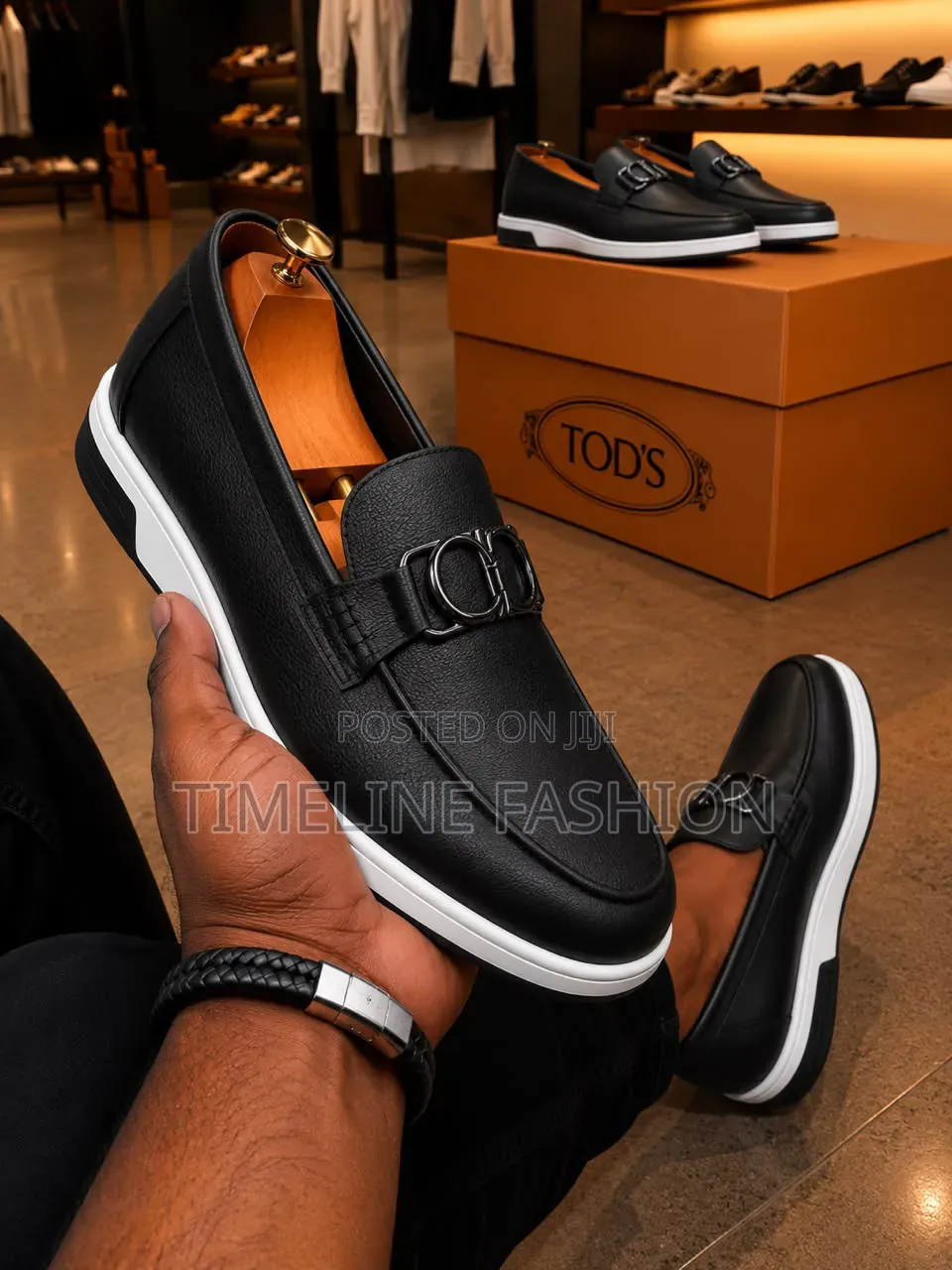 Black and White Tod's Casual Wear Loafers