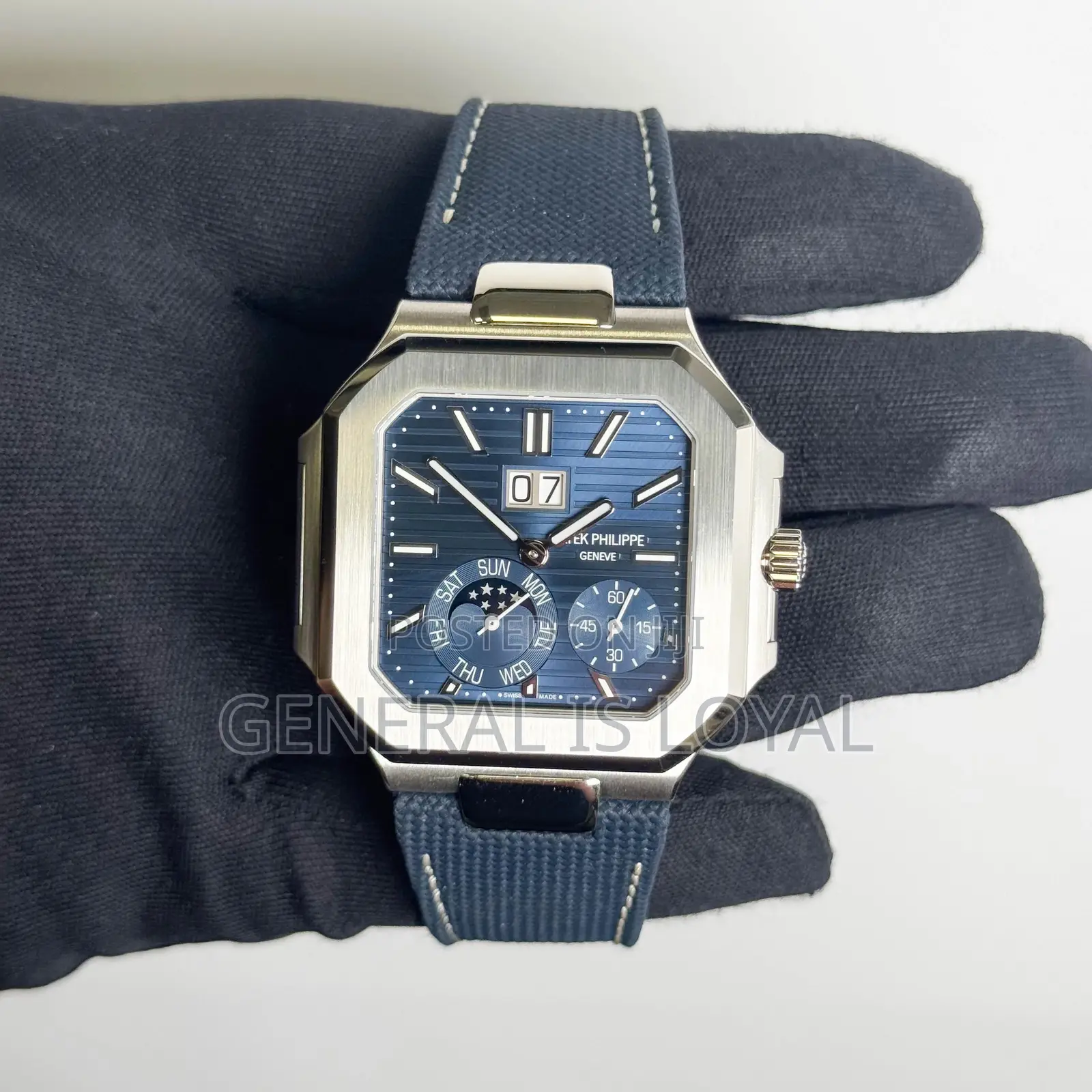 Rectangle Patek Philippe Cubitus Bold Platinum Sunburst Blue Dial.