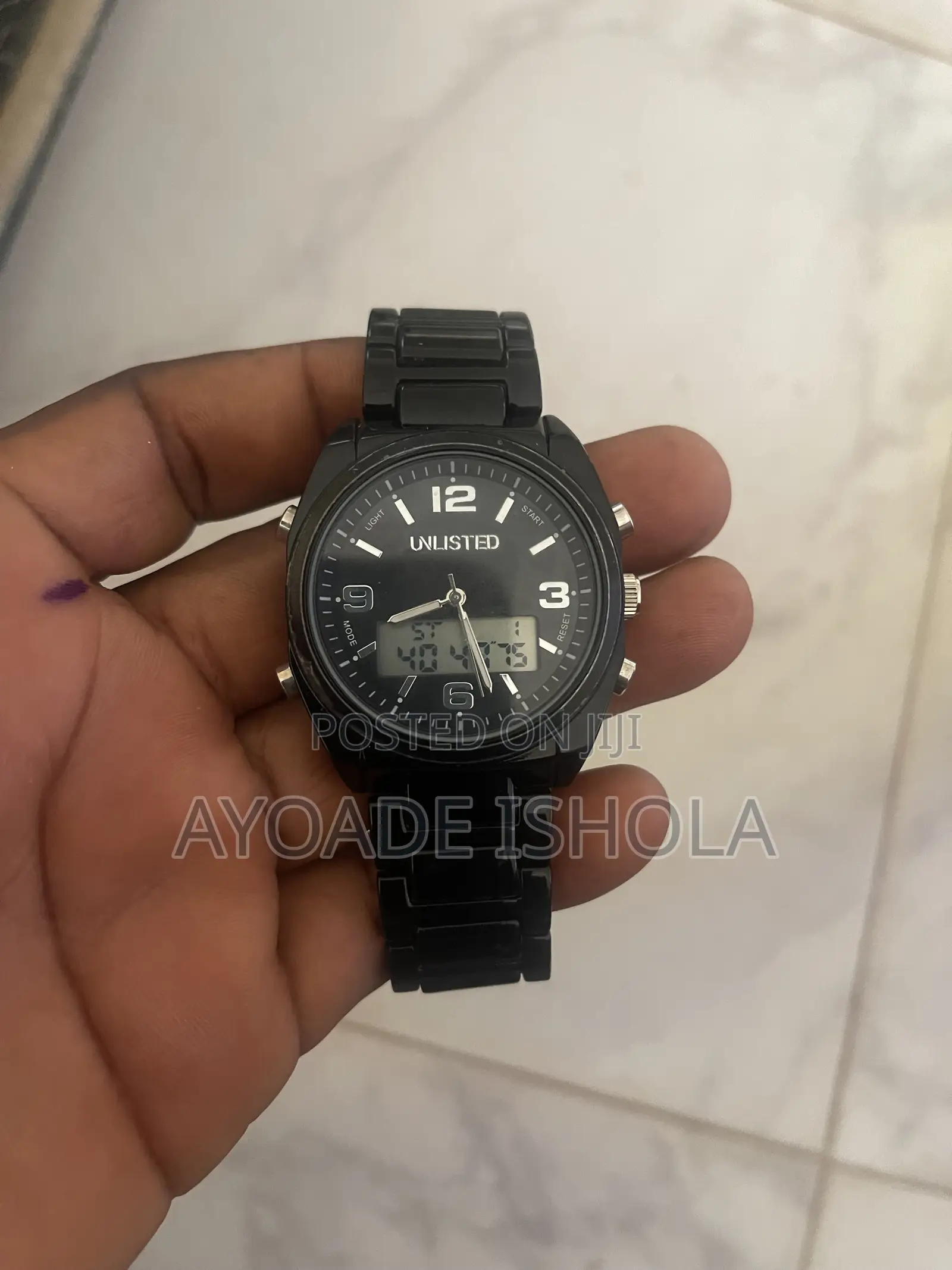 Kenneth Cole Unlisted Watch Features a Display Analog Digital Screen.