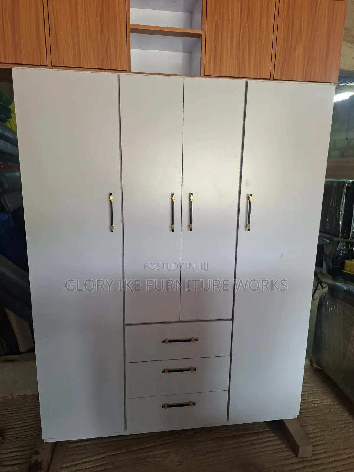 Four Doors Wardrobe With Three Drawers