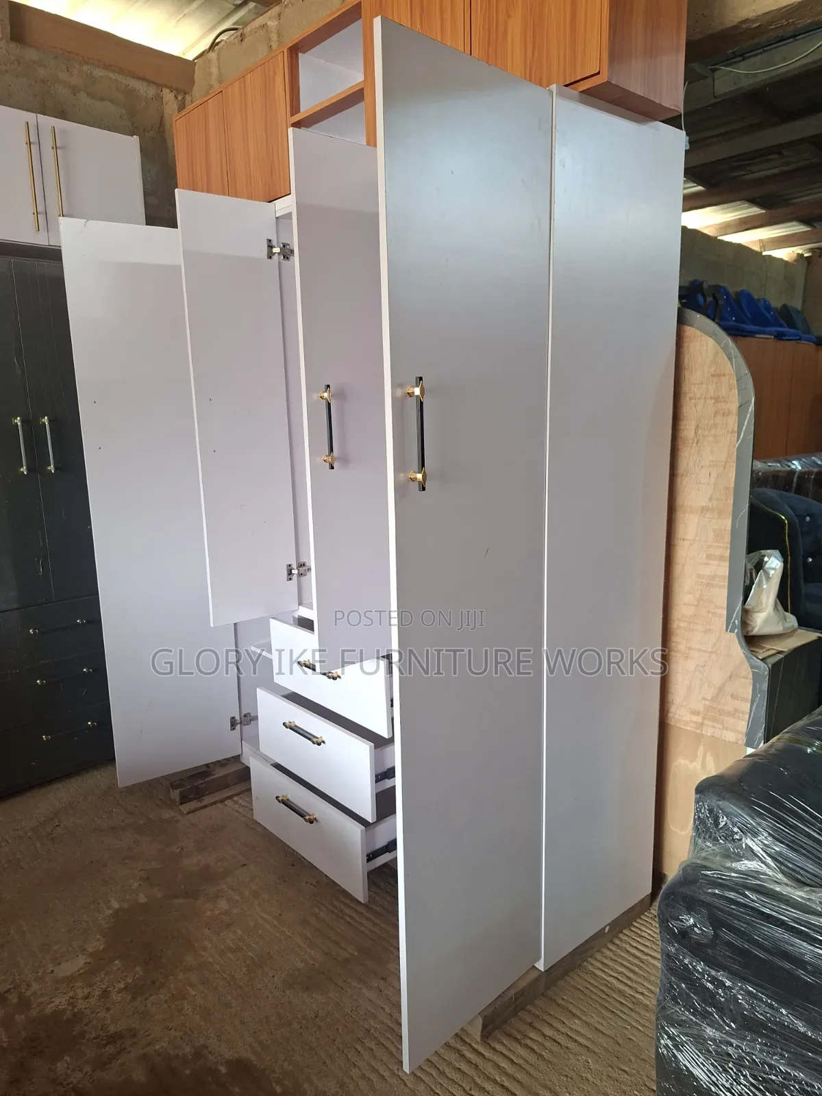 Four Doors Wardrobe With Three Drawers