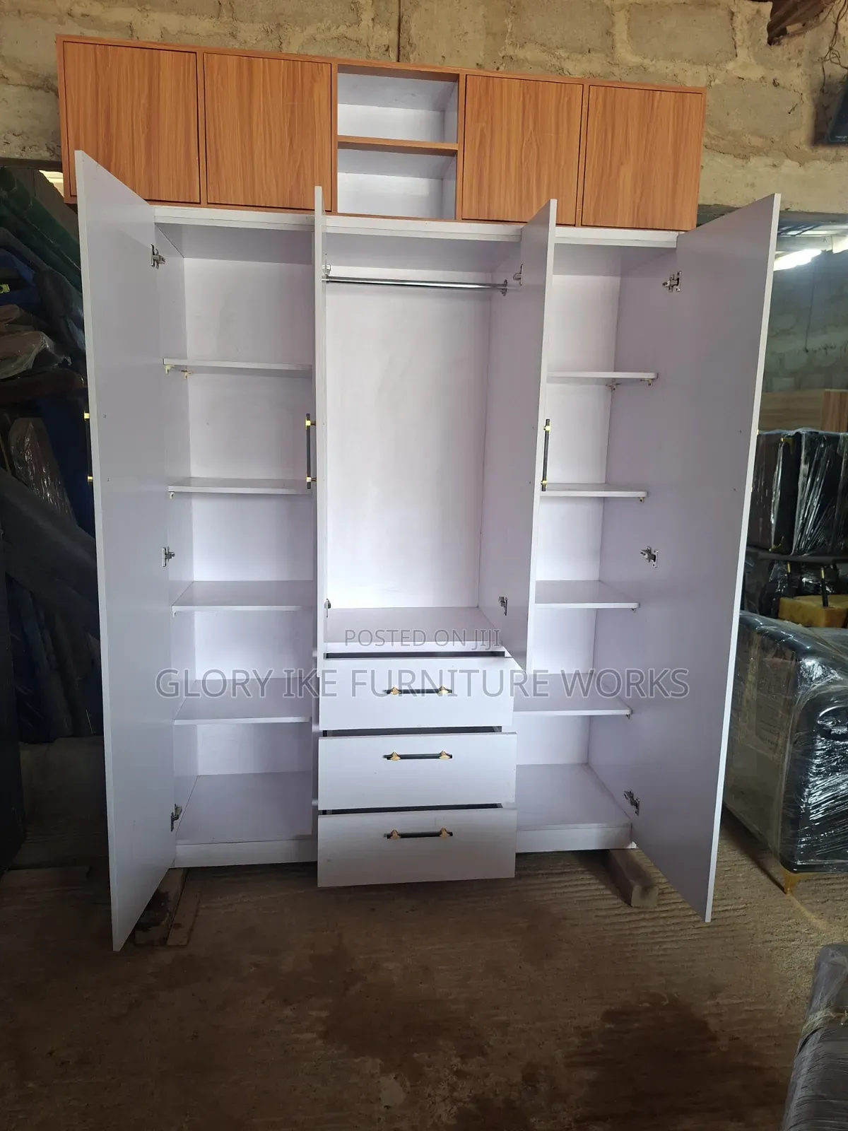 Four Doors Wardrobe With Three Drawers