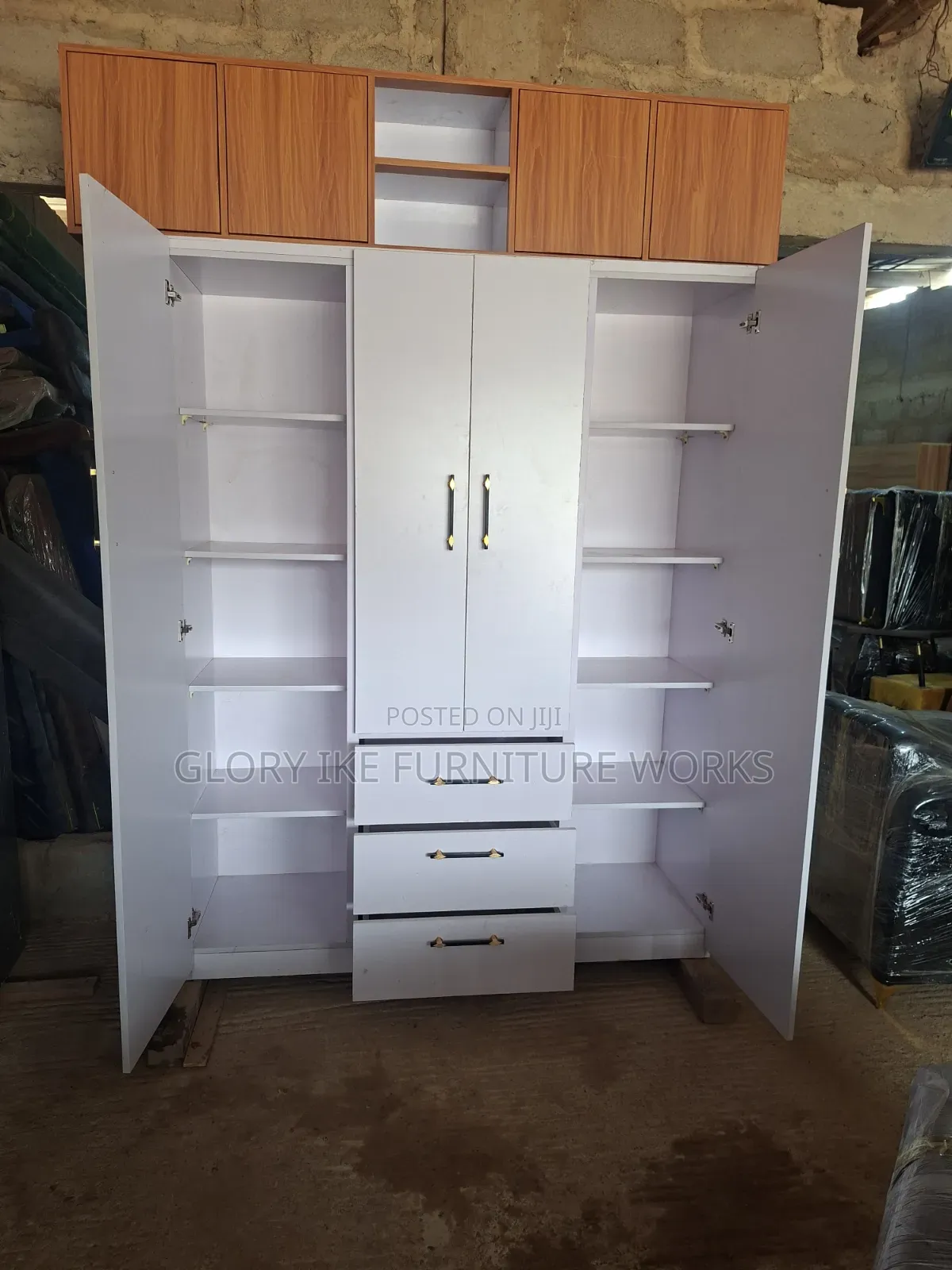 Four Doors Wardrobe With Three Drawers