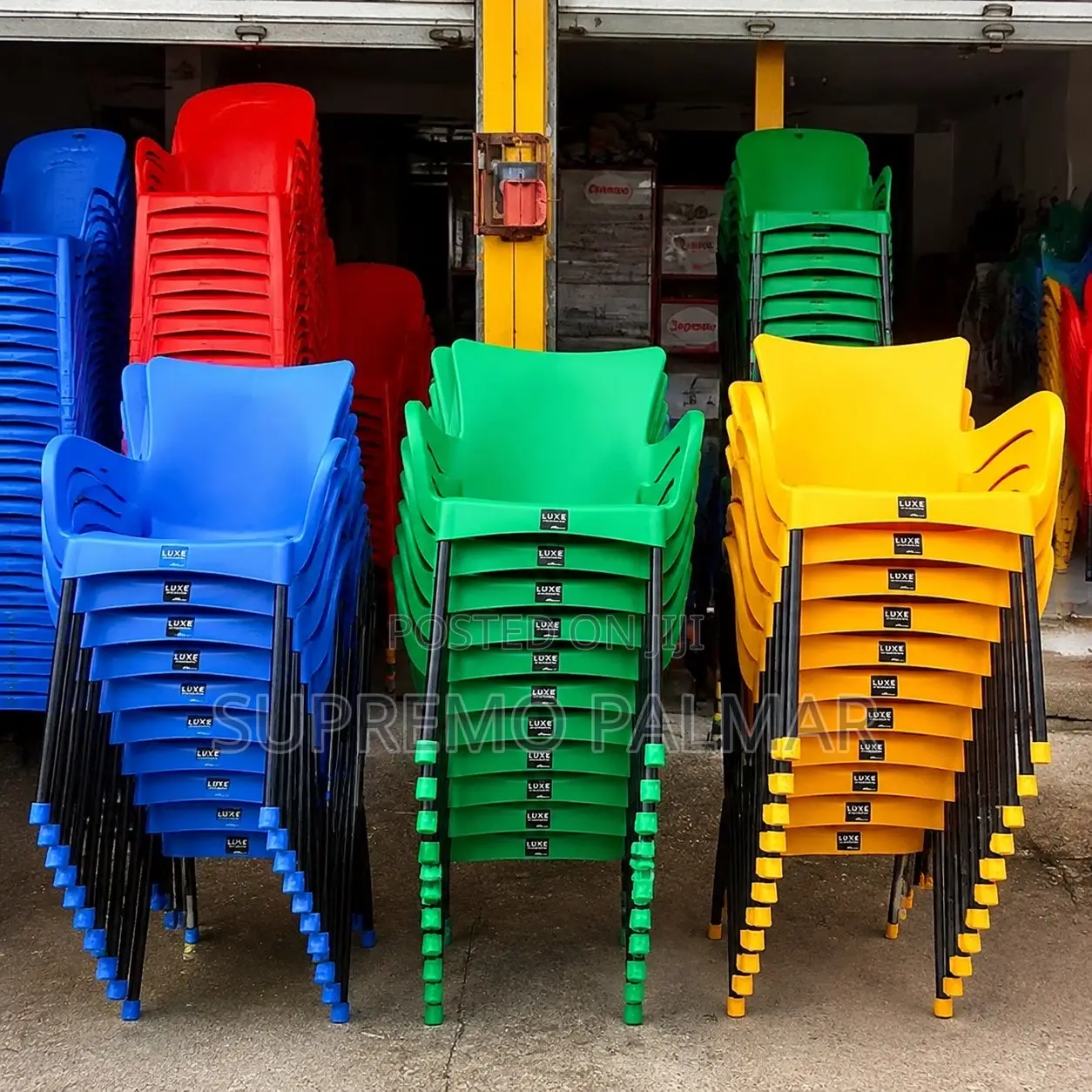Colourful Polypropylene Armchair - Stackable Metal-Frame Seating.