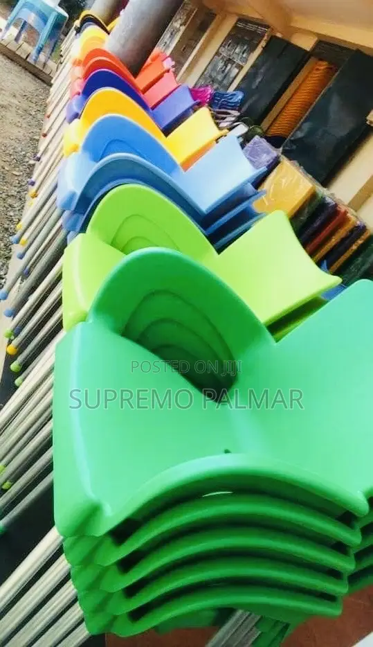 Colourful Polypropylene Armchair - Stackable Metal-Frame Seating.