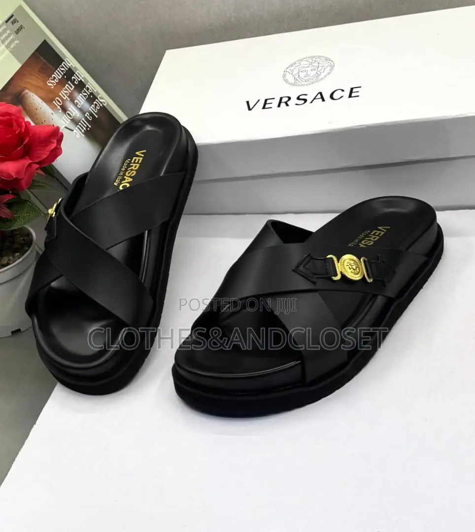 Luxury Versace Leather Sandals Featuring a Crisscross Upper.