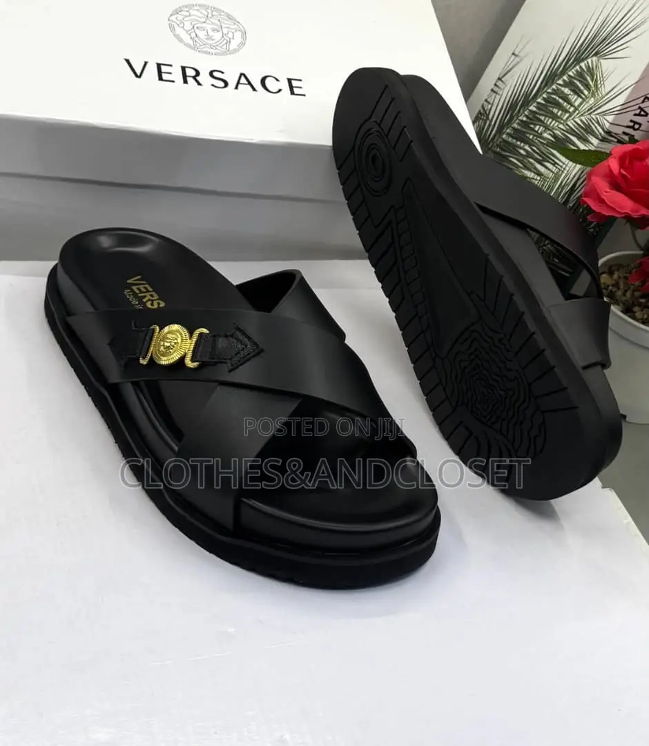 Luxury Versace Leather Sandals Featuring a Crisscross Upper.
