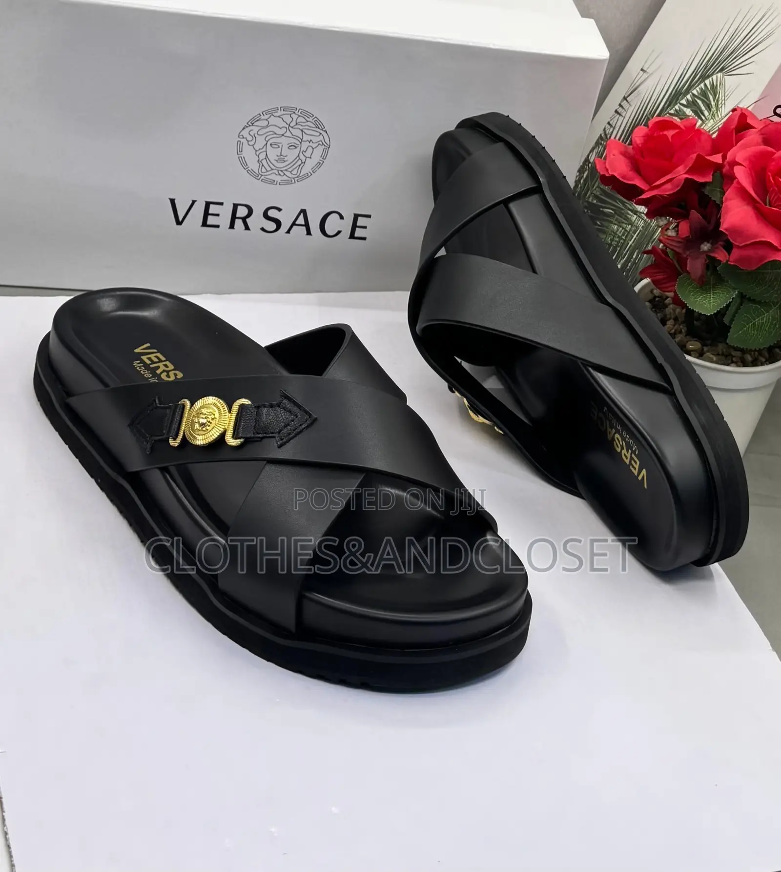 Luxury Versace Leather Sandals Featuring a Crisscross Upper.