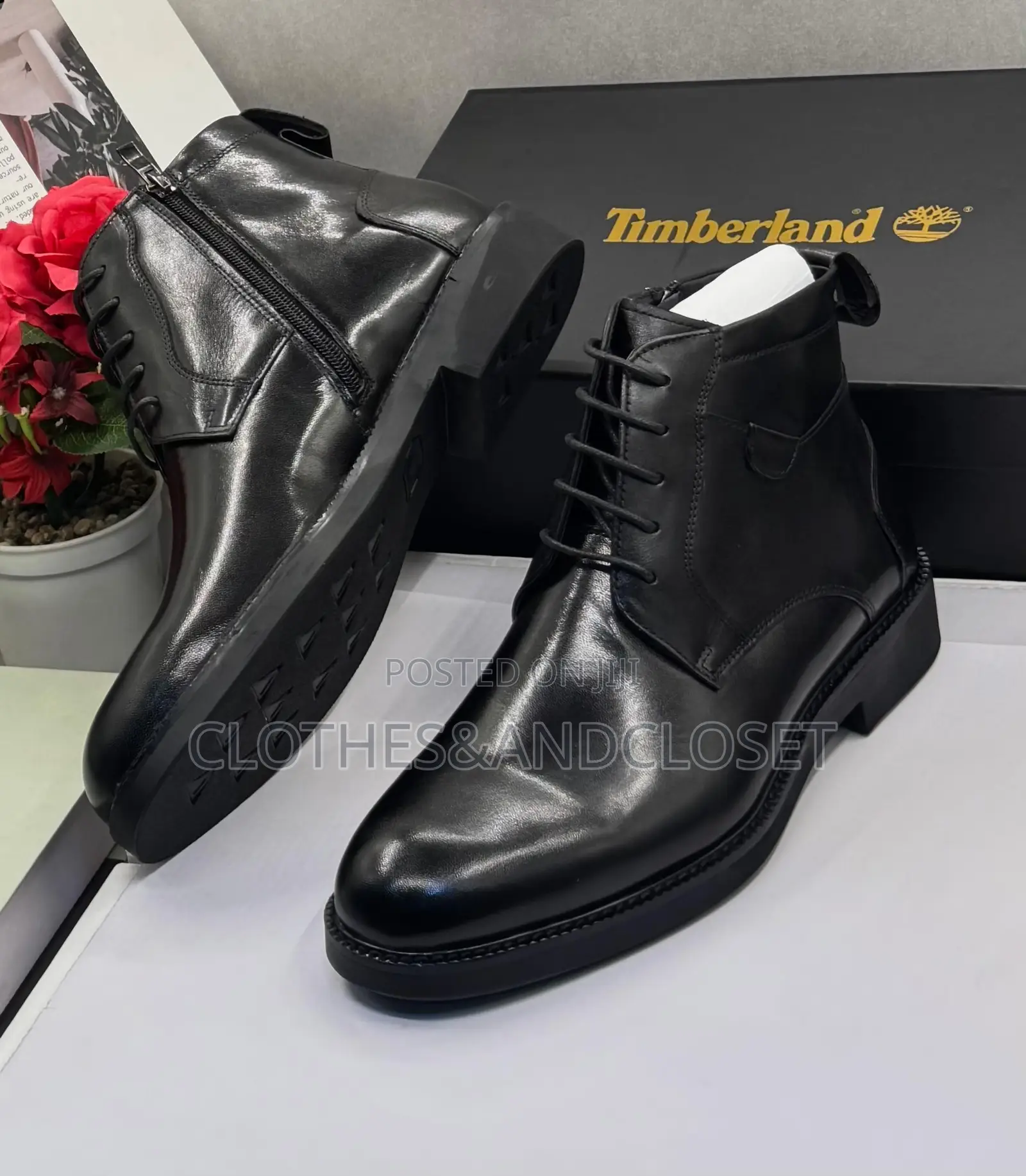 Sleek Black Leather Formal Ankle Boot Feature a Classic Lace-Up Design