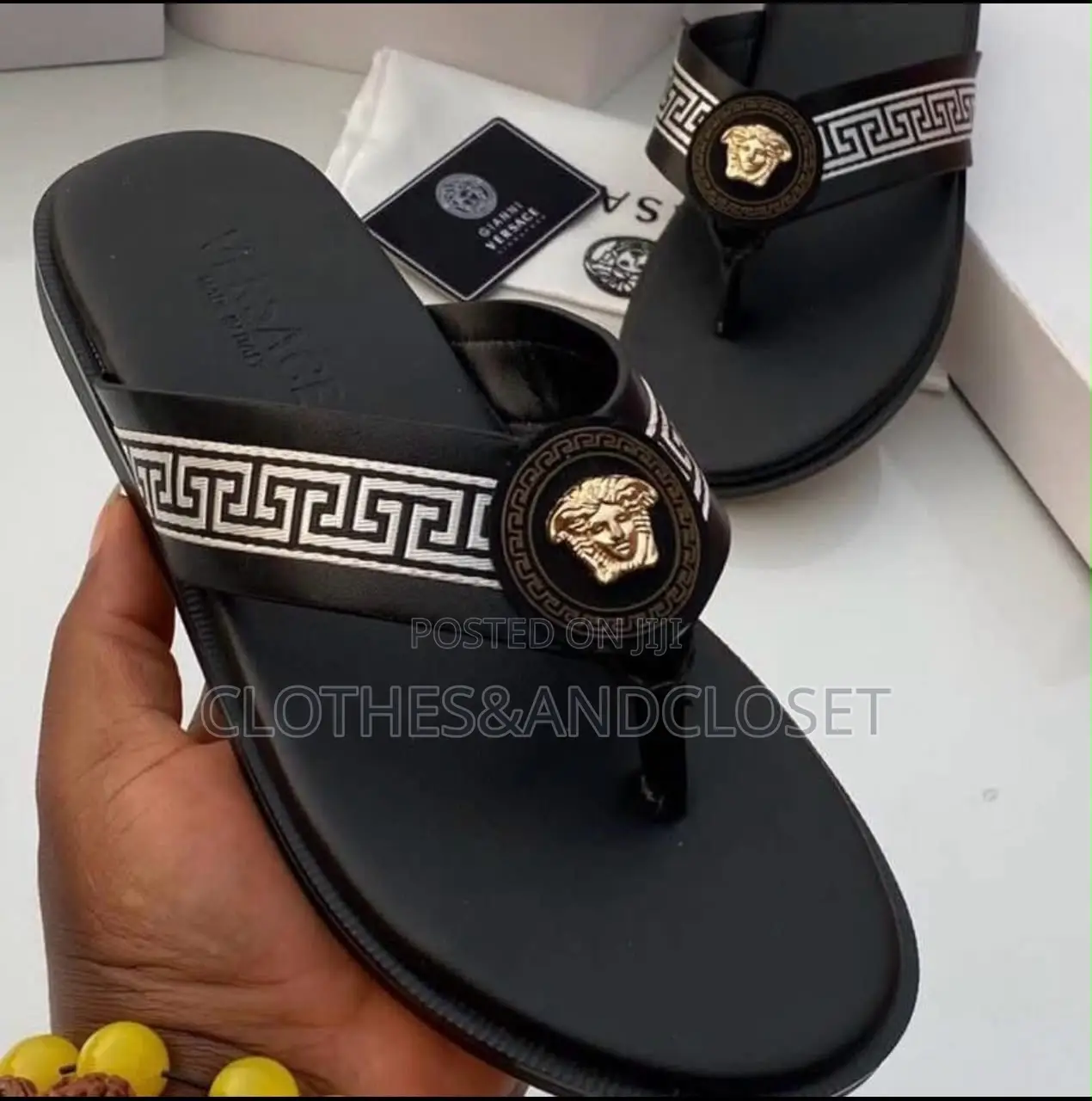 Versace Thong Sandals Feature a Distinctive Gold Medusa Head Medallion